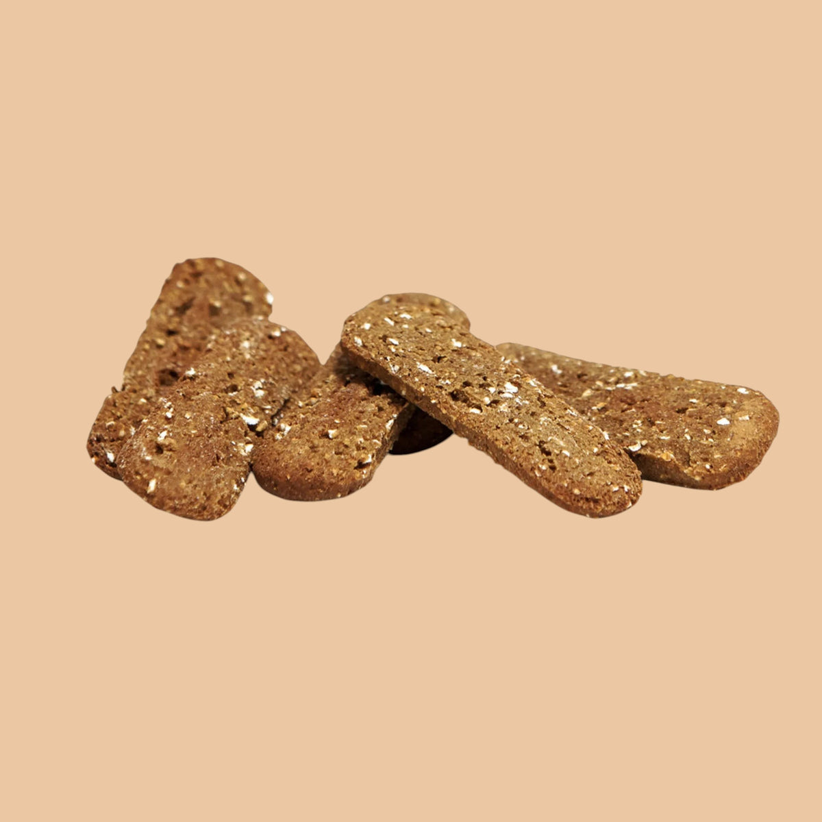 Pets Paradise Love crispy oatmeal chip dog treats, plant-based vegan snacks for dogs on a light tan background.